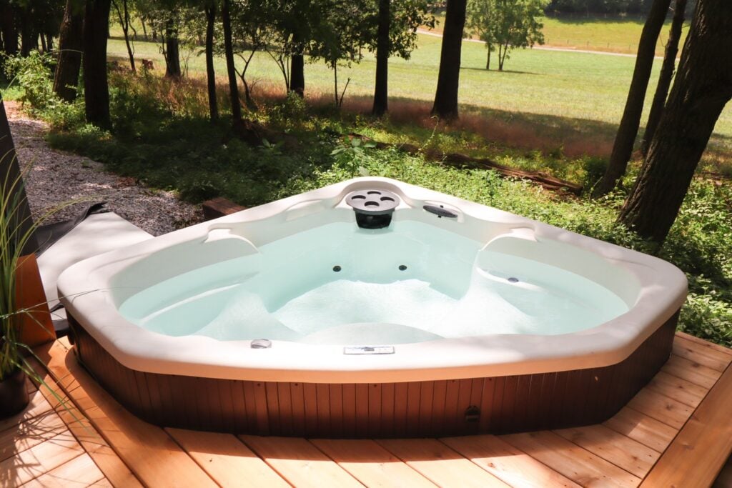 The corner hot tub on the cabin deck