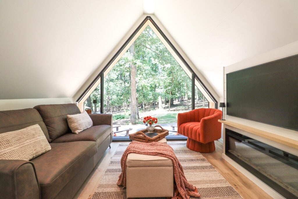The living area with sofa and armchair